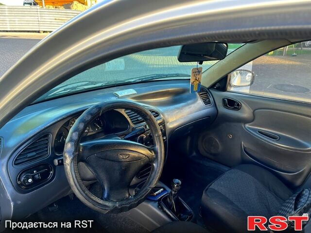 Серый Дэу Ланос, объемом двигателя 1.5 л и пробегом 250 тыс. км за 2400 $, фото 8 на Automoto.ua