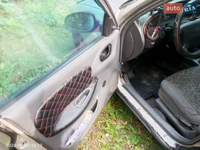 Серый Дэу Ланос, объемом двигателя 1.5 л и пробегом 289 тыс. км за 2200 $, фото 12 на Automoto.ua