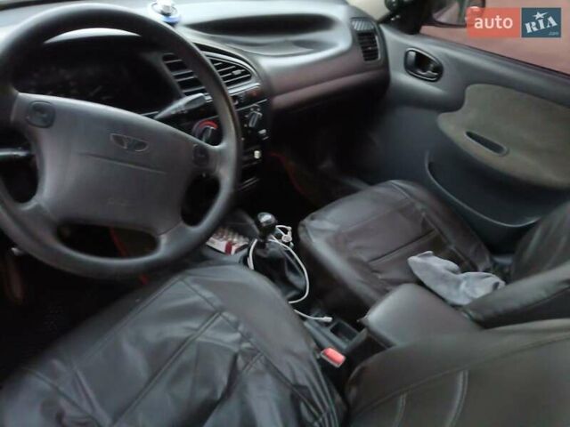 Серый Дэу Ланос, объемом двигателя 1.6 л и пробегом 266 тыс. км за 2950 $, фото 2 на Automoto.ua