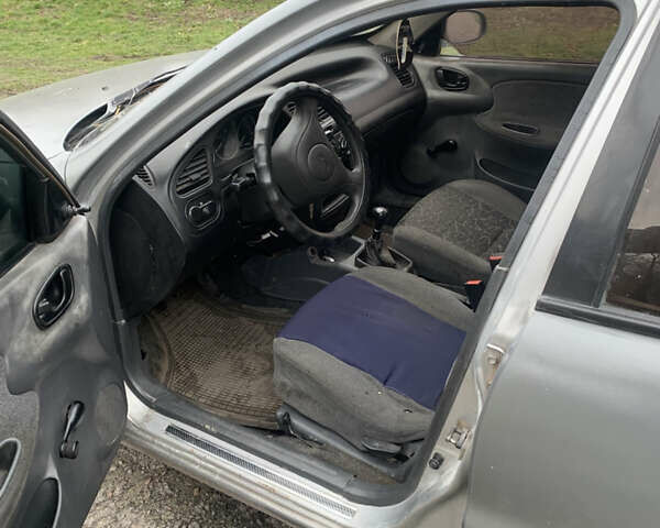 Серый Дэу Ланос, объемом двигателя 1.5 л и пробегом 200 тыс. км за 1200 $, фото 6 на Automoto.ua