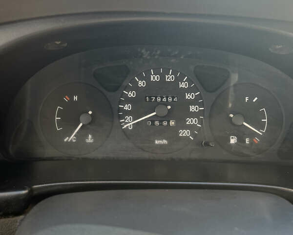 Деу Ланос 2006 у Жмеренке на Automoto.ua Сірий Деу Ланос, об'ємом двигуна 1.3 л та пробігом 179 тис. км за 1650 $, фото 10 на Automoto.ua