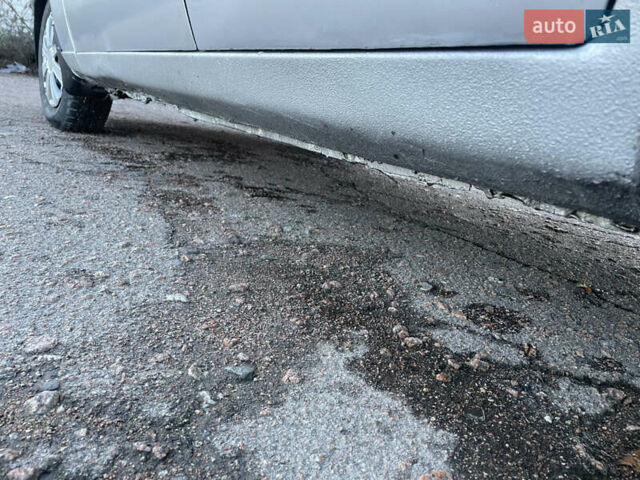 Серый Дэу Ланос, объемом двигателя 1.5 л и пробегом 250 тыс. км за 1450 $, фото 30 на Automoto.ua