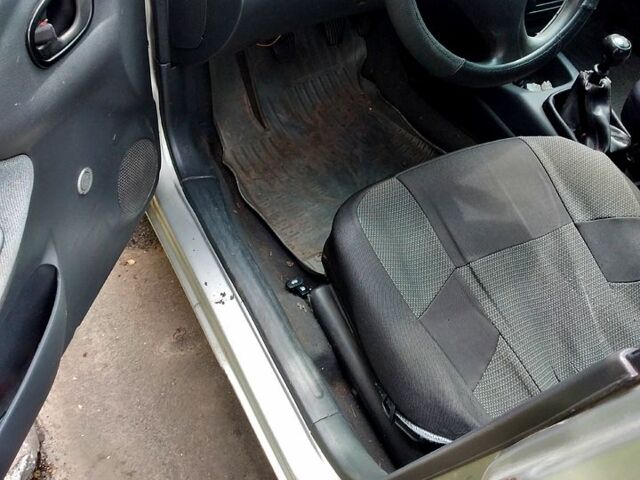 Сірий Деу Ланос, об'ємом двигуна 1.5 л та пробігом 400 тис. км за 1000 $, фото 12 на Automoto.ua