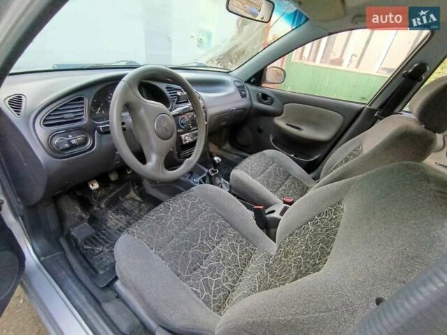 Серый Дэу Ланос, объемом двигателя 1.5 л и пробегом 270 тыс. км за 1700 $, фото 6 на Automoto.ua