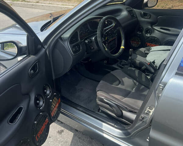 Сірий Деу Ланос, об'ємом двигуна 1.6 л та пробігом 150 тис. км за 3550 $, фото 9 на Automoto.ua