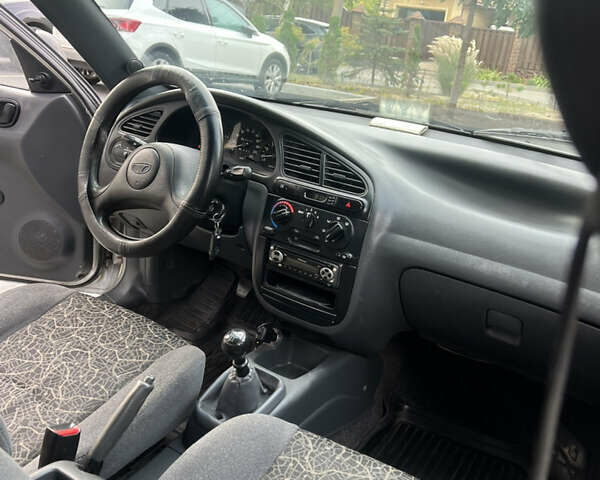 Сірий Деу Ланос, об'ємом двигуна 1.5 л та пробігом 199 тис. км за 2600 $, фото 38 на Automoto.ua