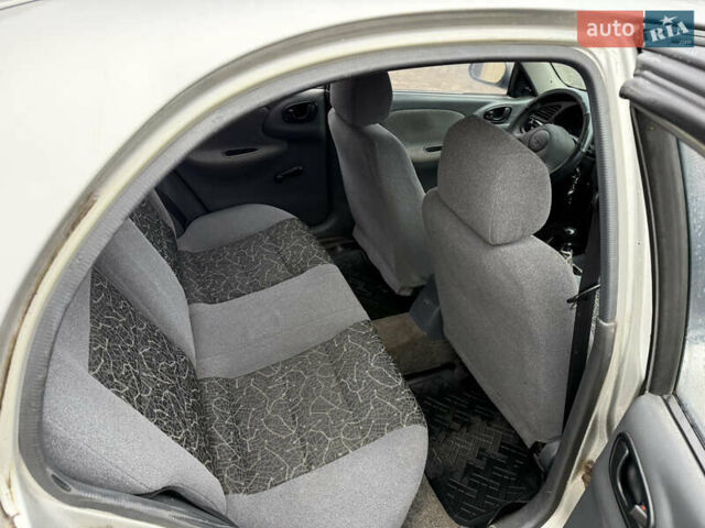 Серый Дэу Ланос, объемом двигателя 1.5 л и пробегом 203 тыс. км за 1750 $, фото 9 на Automoto.ua