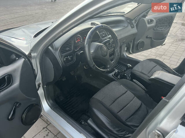 Серый Дэу Ланос, объемом двигателя 1.5 л и пробегом 210 тыс. км за 2100 $, фото 7 на Automoto.ua