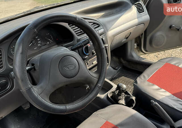 Серый Дэу Ланос, объемом двигателя 1.35 л и пробегом 180 тыс. км за 1250 $, фото 12 на Automoto.ua