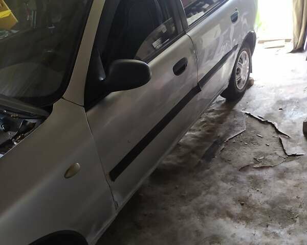 Серый Дэу Ланос, объемом двигателя 1.5 л и пробегом 350 тыс. км за 948 $, фото 2 на Automoto.ua