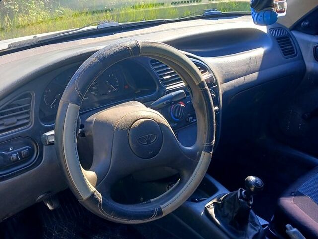 Серый Дэу Ланос, объемом двигателя 1.5 л и пробегом 440 тыс. км за 2000 $, фото 2 на Automoto.ua