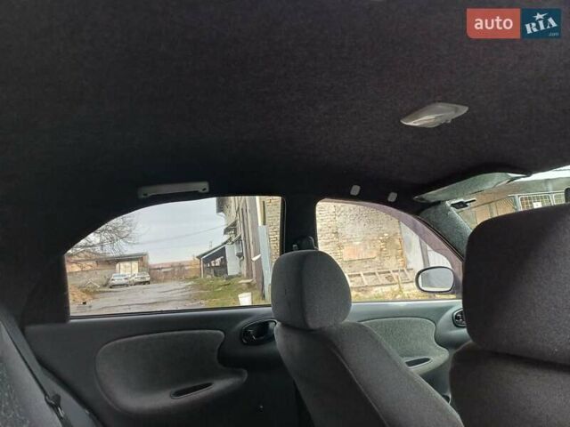 Сірий Деу Ланос, об'ємом двигуна 1.5 л та пробігом 181 тис. км за 1700 $, фото 9 на Automoto.ua