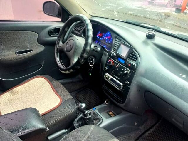 Сірий Деу Ланос, об'ємом двигуна 1.5 л та пробігом 200 тис. км за 2250 $, фото 4 на Automoto.ua