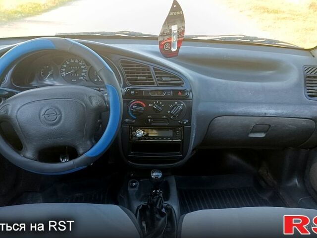 Серый Дэу Ланос, объемом двигателя 1.5 л и пробегом 333 тыс. км за 1400 $, фото 4 на Automoto.ua