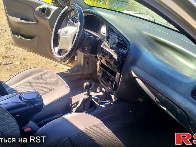 Серый Дэу Ланос, объемом двигателя 1.6 л и пробегом 298 тыс. км за 2500 $, фото 3 на Automoto.ua