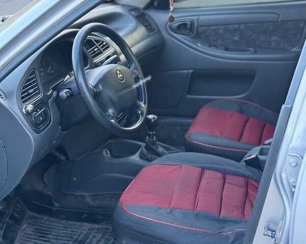 Сірий Деу Ланос, об'ємом двигуна 1.5 л та пробігом 150 тис. км за 1950 $, фото 2 на Automoto.ua