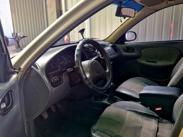 Сірий Деу Ланос, об'ємом двигуна 1.5 л та пробігом 197 тис. км за 1950 $, фото 6 на Automoto.ua