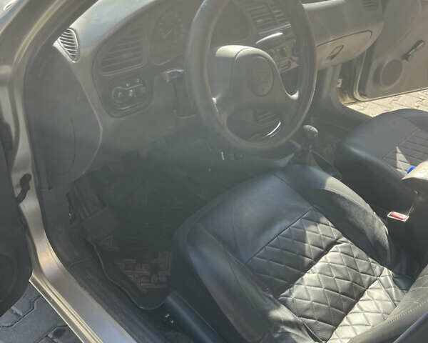 Деу Ланос 2006 у Жмеренке на Automoto.ua Сірий Деу Ланос, об'ємом двигуна 1.3 л та пробігом 179 тис. км за 1650 $, фото 12 на Automoto.ua