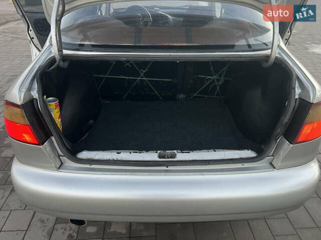 Серый Дэу Ланос, объемом двигателя 1.5 л и пробегом 210 тыс. км за 2100 $, фото 12 на Automoto.ua