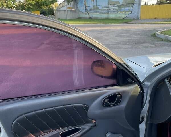 Сірий Деу Ланос, об'ємом двигуна 1.5 л та пробігом 252 тис. км за 1900 $, фото 3 на Automoto.ua