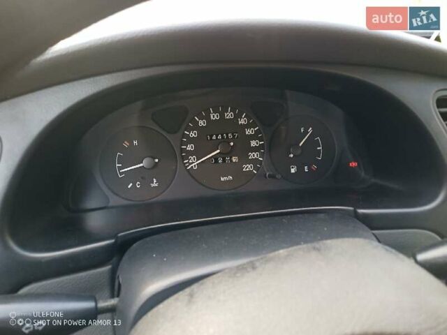 Серый Дэу Ланос, объемом двигателя 1.5 л и пробегом 144 тыс. км за 2200 $, фото 6 на Automoto.ua