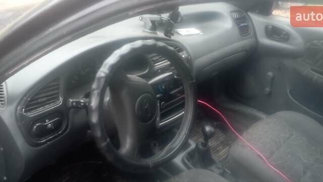 Серый Дэу Ланос, объемом двигателя 1.52 л и пробегом 215 тыс. км за 900 $, фото 5 на Automoto.ua