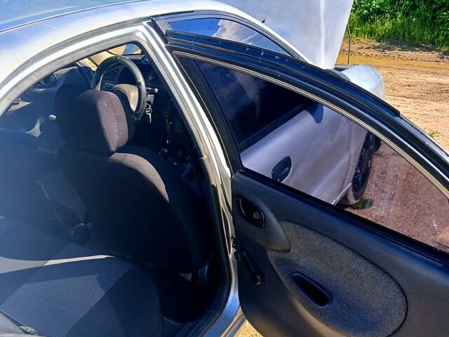 Серый Дэу Ланос, объемом двигателя 1.5 л и пробегом 440 тыс. км за 2000 $, фото 4 на Automoto.ua