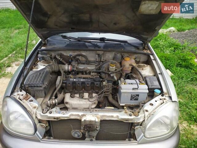 Серый Дэу Ланос, объемом двигателя 1.5 л и пробегом 350 тыс. км за 948 $, фото 1 на Automoto.ua