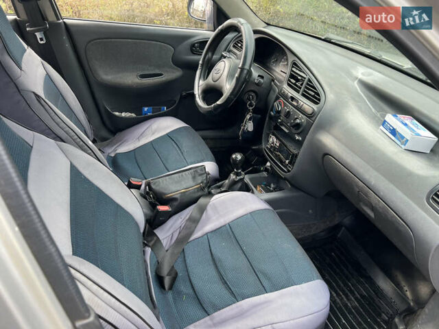 Серый Дэу Ланос, объемом двигателя 1.5 л и пробегом 207 тыс. км за 1400 $, фото 11 на Automoto.ua