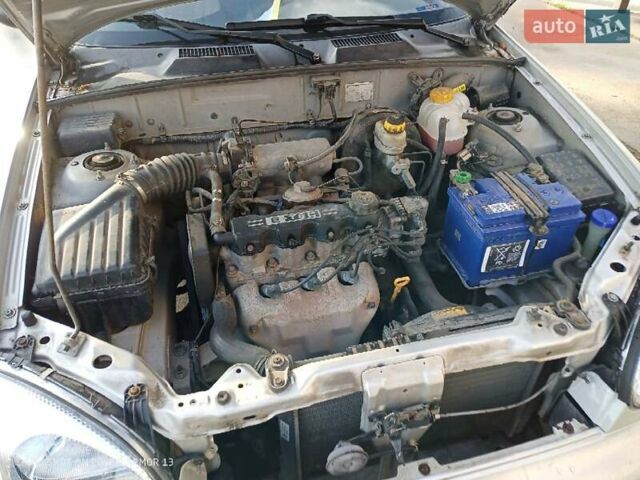 Серый Дэу Ланос, объемом двигателя 1.5 л и пробегом 144 тыс. км за 2200 $, фото 7 на Automoto.ua