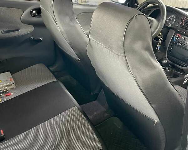 Серый Дэу Ланос, объемом двигателя 1.5 л и пробегом 223 тыс. км за 2700 $, фото 8 на Automoto.ua