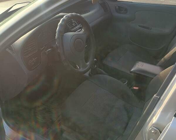 Серый Дэу Ланос, объемом двигателя 1.5 л и пробегом 300 тыс. км за 1900 $, фото 1 на Automoto.ua