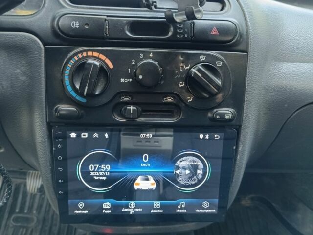 Серый Дэу Ланос, объемом двигателя 1.6 л и пробегом 245 тыс. км за 1400 $, фото 5 на Automoto.ua