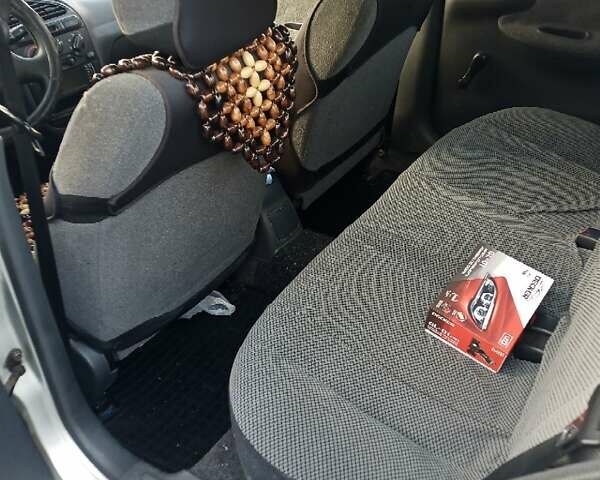 Серый Дэу Ланос, объемом двигателя 1.5 л и пробегом 144 тыс. км за 2200 $, фото 4 на Automoto.ua