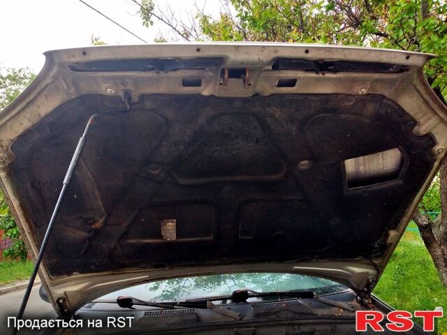 Сірий Деу Ланос, об'ємом двигуна 1.5 л та пробігом 400 тис. км за 1000 $, фото 5 на Automoto.ua