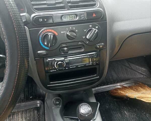 Сірий Деу Ланос, об'ємом двигуна 1.5 л та пробігом 220 тис. км за 2500 $, фото 11 на Automoto.ua