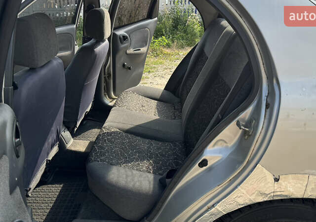 Серый Дэу Ланос, объемом двигателя 1.35 л и пробегом 180 тыс. км за 1250 $, фото 8 на Automoto.ua