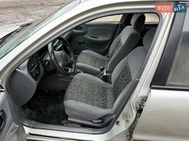 Серый Дэу Ланос, объемом двигателя 1.5 л и пробегом 203 тыс. км за 1750 $, фото 7 на Automoto.ua