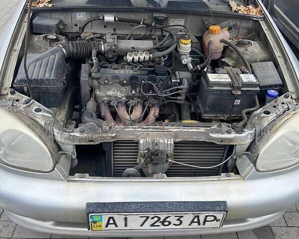 Серый Дэу Ланос, объемом двигателя 1.5 л и пробегом 328 тыс. км за 1350 $, фото 2 на Automoto.ua