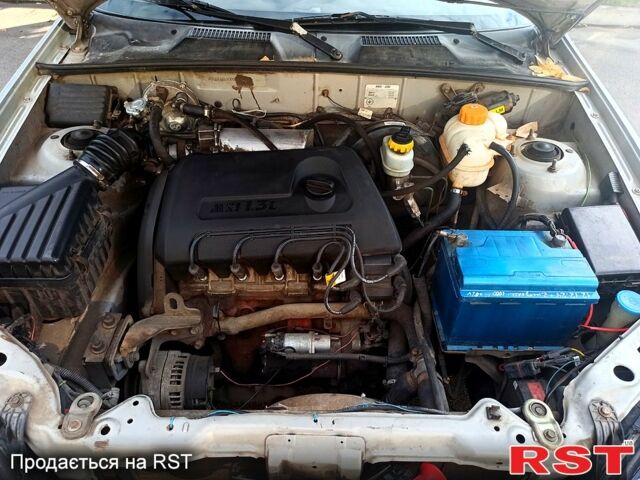 Сірий Деу Ланос, об'ємом двигуна 1.3 л та пробігом 300 тис. км за 1700 $, фото 7 на Automoto.ua