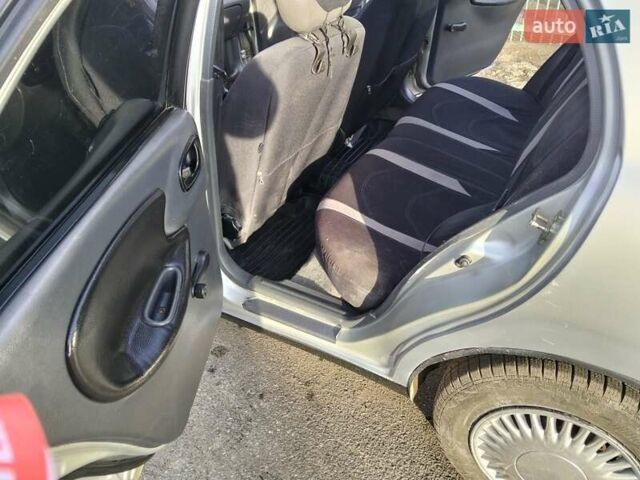 Сірий Деу Ланос, об'ємом двигуна 1.5 л та пробігом 255 тис. км за 1700 $, фото 9 на Automoto.ua