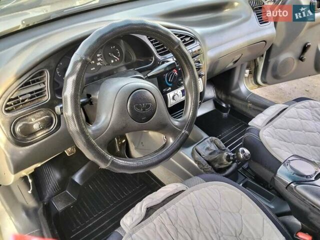 Сірий Деу Ланос, об'ємом двигуна 1.5 л та пробігом 255 тис. км за 1700 $, фото 7 на Automoto.ua