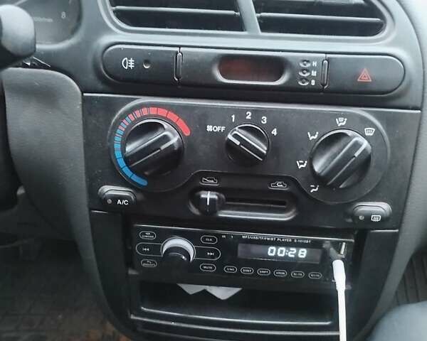 Серый Дэу Ланос, объемом двигателя 1.5 л и пробегом 201 тыс. км за 3500 $, фото 10 на Automoto.ua