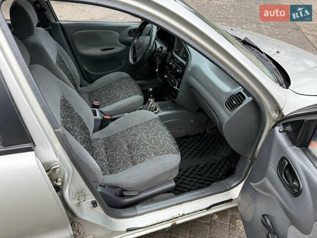 Серый Дэу Ланос, объемом двигателя 1.5 л и пробегом 203 тыс. км за 1750 $, фото 8 на Automoto.ua