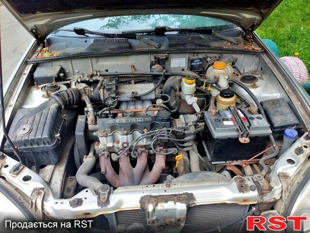 Сірий Деу Ланос, об'ємом двигуна 1.5 л та пробігом 400 тис. км за 1000 $, фото 6 на Automoto.ua