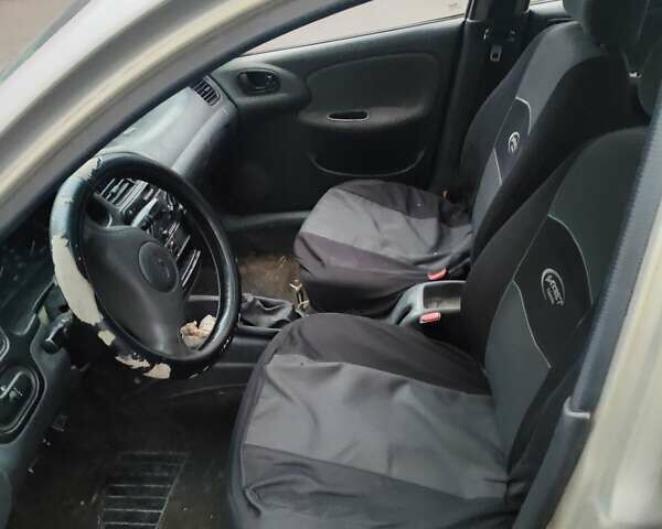 Серый Дэу Ланос, объемом двигателя 1.5 л и пробегом 341 тыс. км за 850 $, фото 5 на Automoto.ua