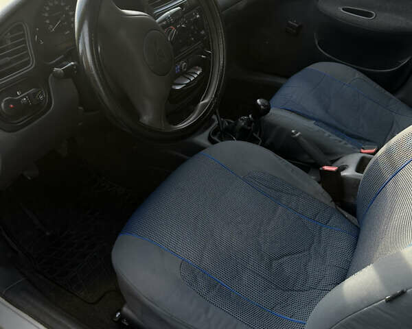 Серый Дэу Ланос, объемом двигателя 1.5 л и пробегом 225 тыс. км за 2000 $, фото 5 на Automoto.ua