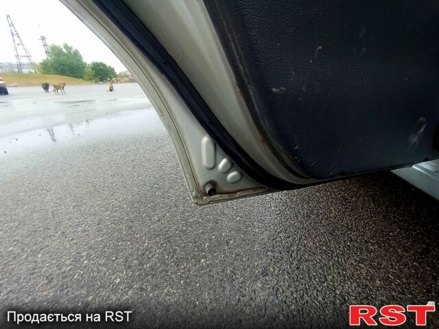 Сірий Деу Ланос, об'ємом двигуна 1.3 л та пробігом 250 тис. км за 1750 $, фото 4 на Automoto.ua