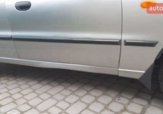 Сірий Деу Ланос, об'ємом двигуна 1.5 л та пробігом 255 тис. км за 2250 $, фото 1 на Automoto.ua