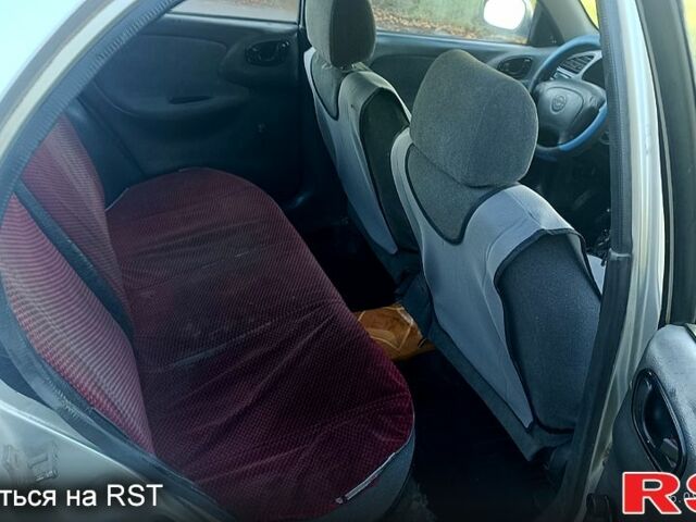 Серый Дэу Ланос, объемом двигателя 1.5 л и пробегом 333 тыс. км за 1400 $, фото 5 на Automoto.ua